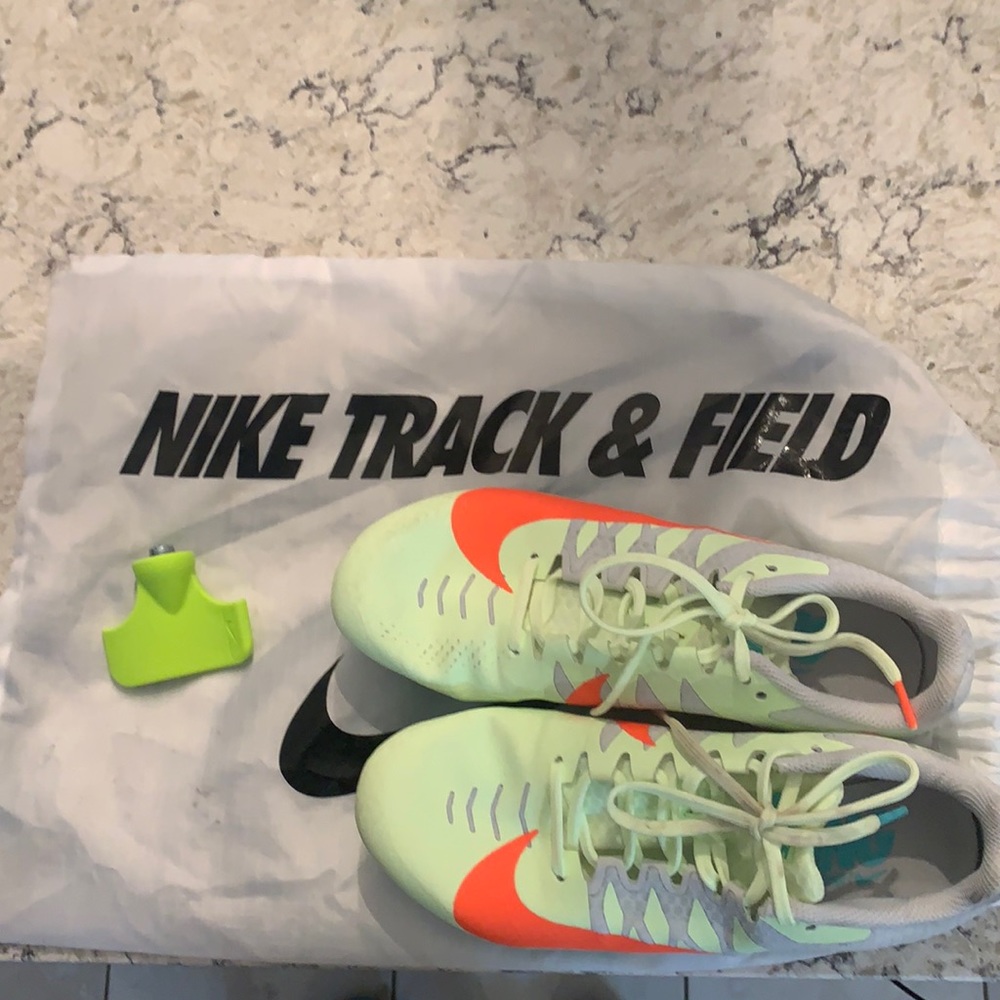 Yellow and Orange Nike zoom Rival Sprint